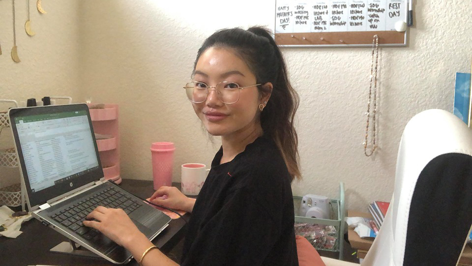 Lor in her workspace at home.