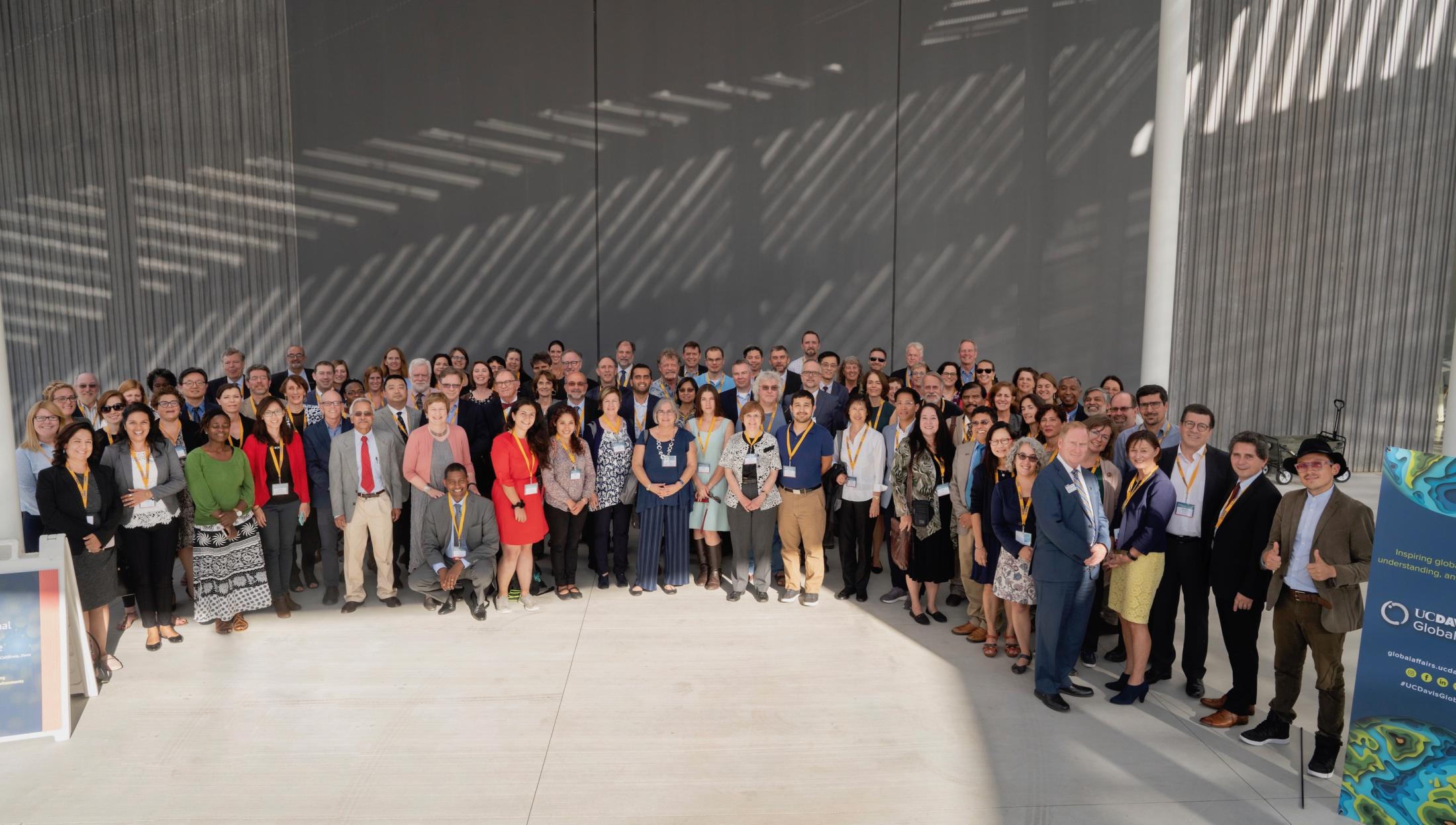 conference group photo outside museum