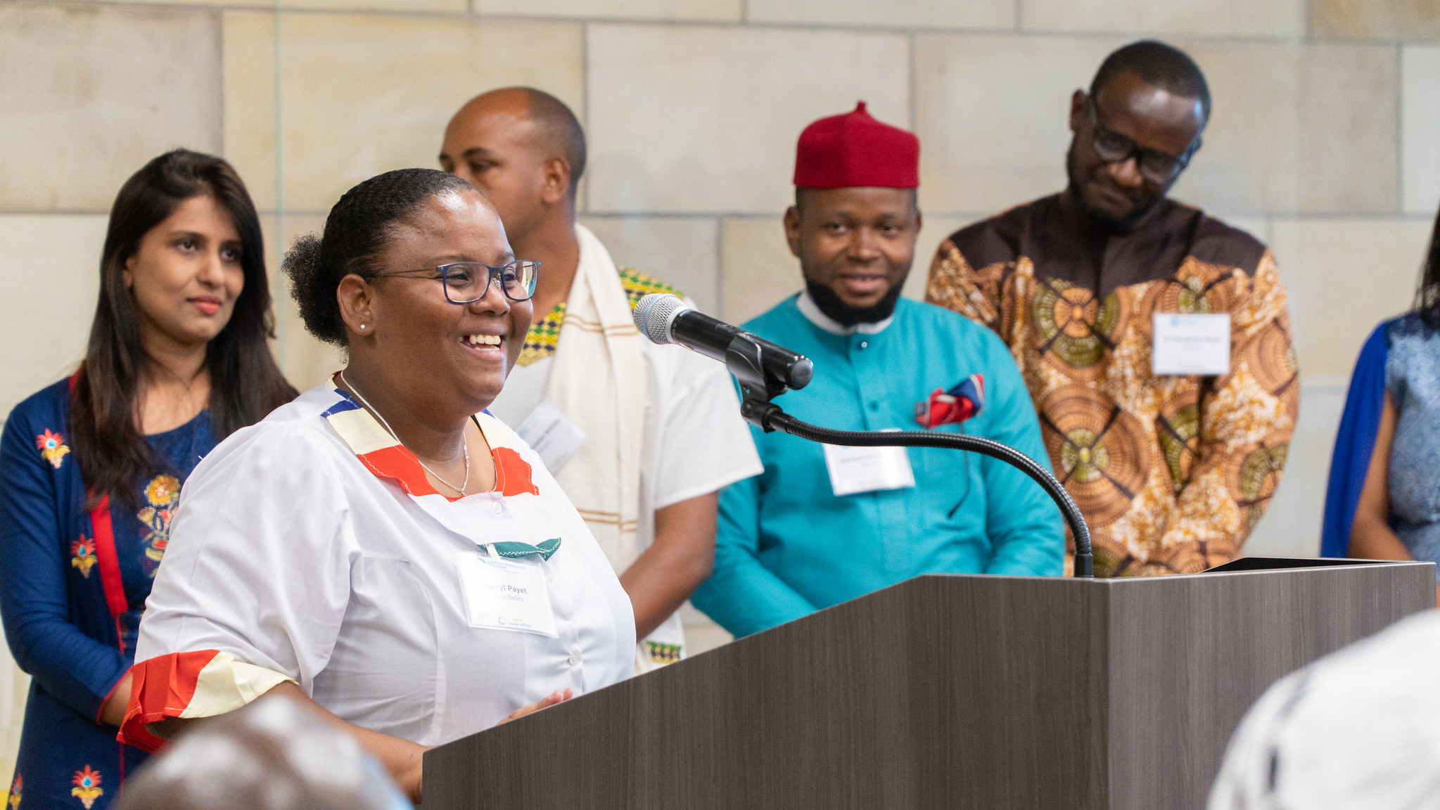 woman at podium speaking 