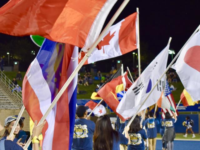 Students waving flags 