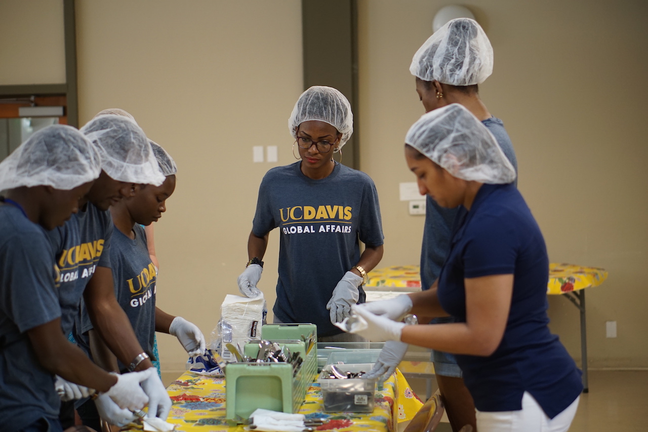 Wilsona Jalloh (center) volunteers with Davis Community Meals