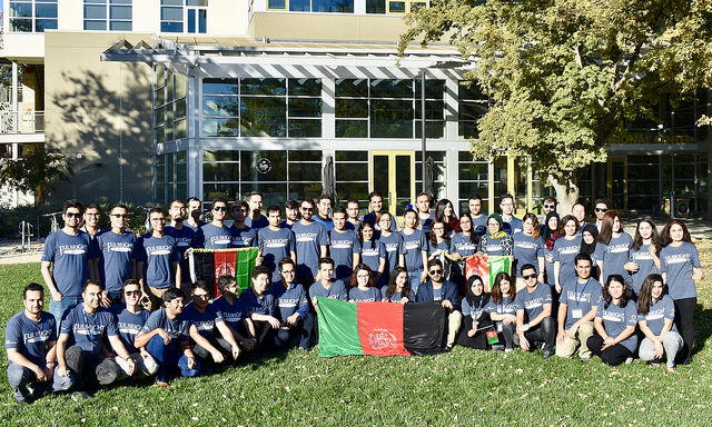 afghan fulbright students in front of the international center