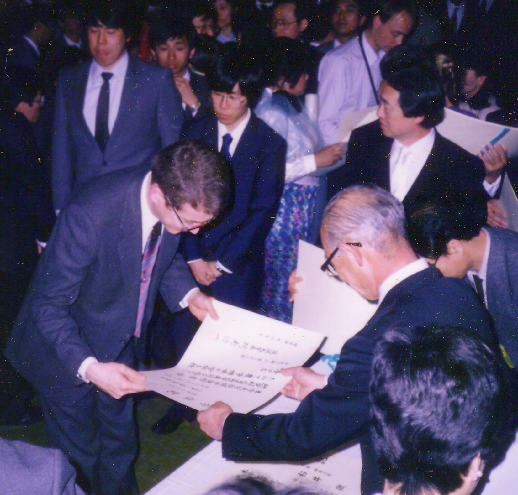 Leal receives his diploma in Japan