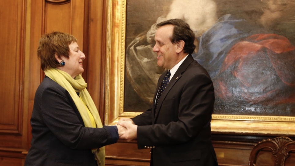 UC Davis Vice Provost and Associate Chancellor of Global Affairs Joanna Regulska shaking hands with Pontificia Universidad Católica de Chile Rector Ignacio Sánchez after signing an Agreement of Cooperation. Photo courtesy of Pontificia Universidad Católica de Chile.