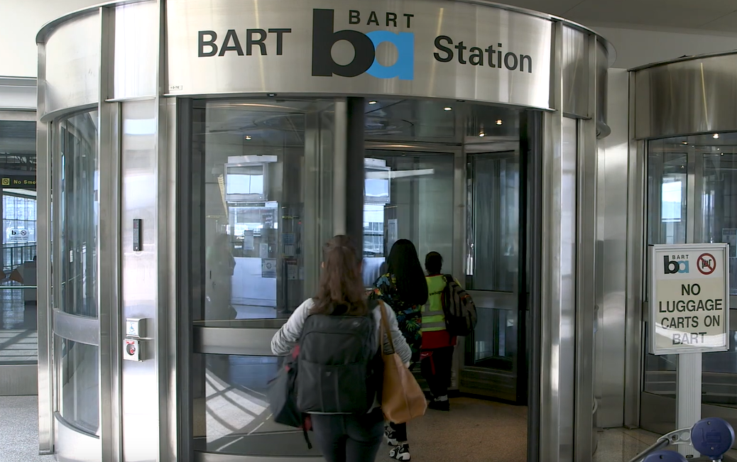 Sign at the airport terminal that reads 'BART'.