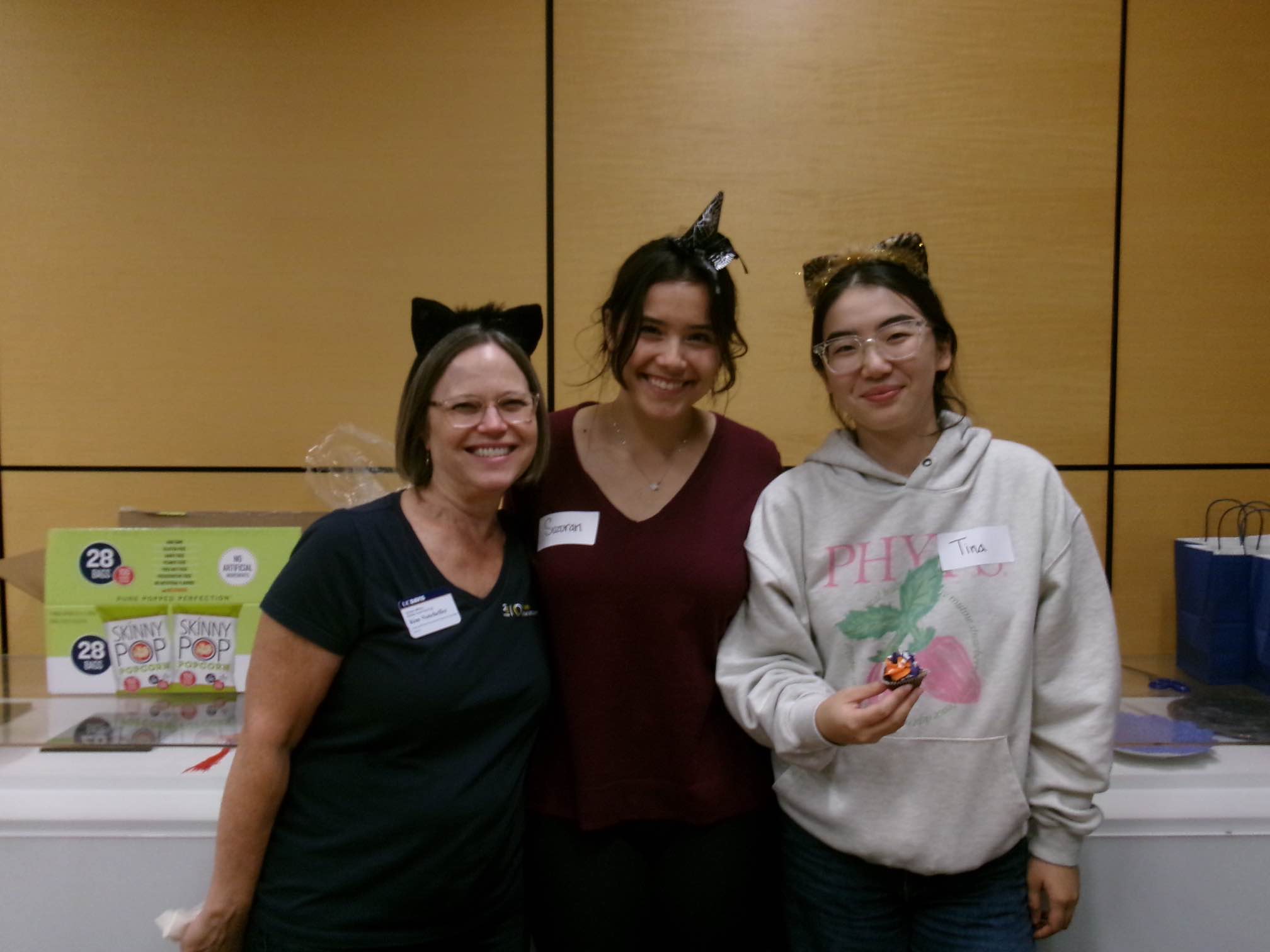 Tina, Suzuran, and Kim Notehelfer smile in Halloween attire as they host the GAMP Halloween event.