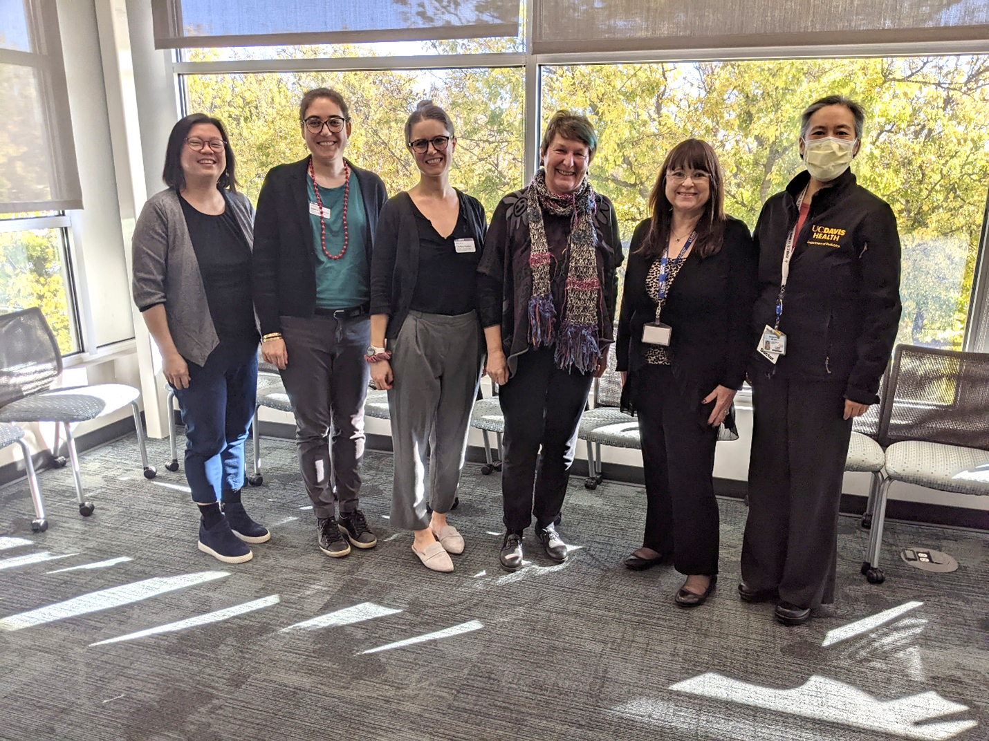 Six UC Davis faculty and staff members involved in the Asia Pacific Women in Leadership Mentoring Program smile at the camera camera