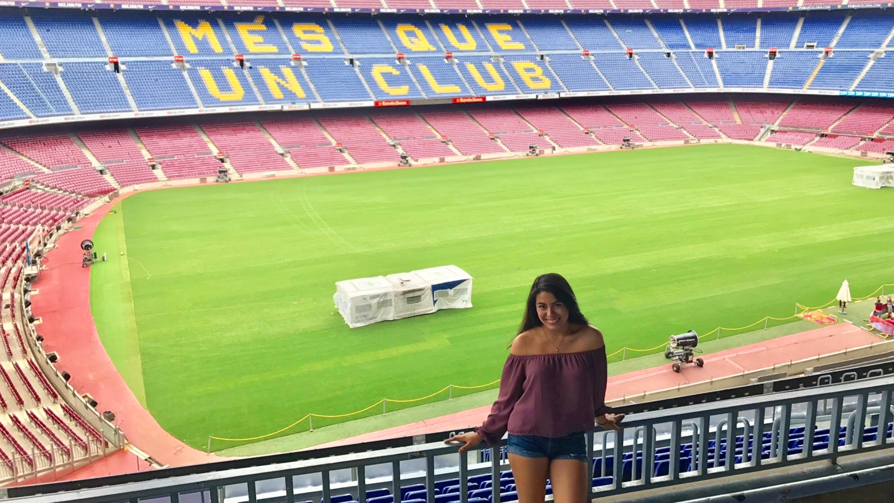 Global Aggies - Photo of Student in front of soccer field