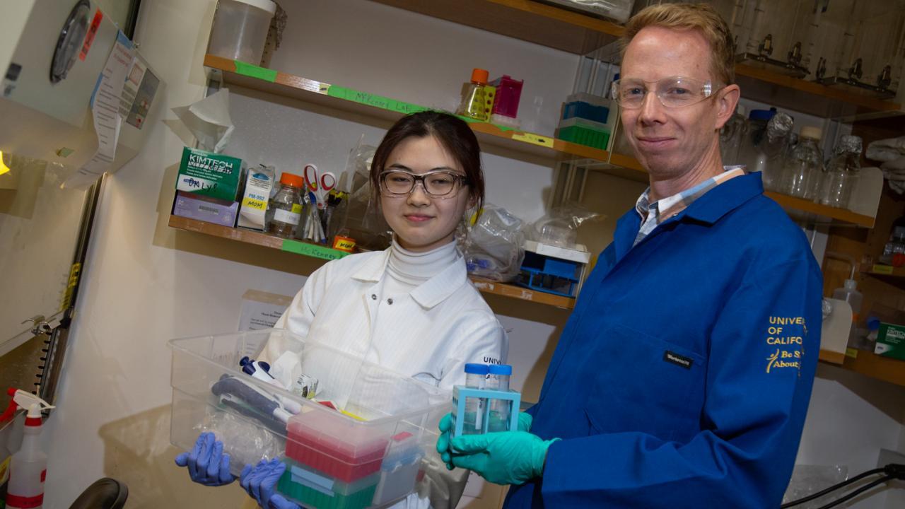 Wenzhe Li stands with Assistant Professor Richard McKenney