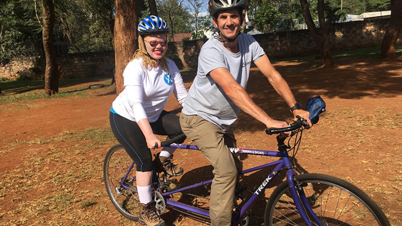 Two people on bike