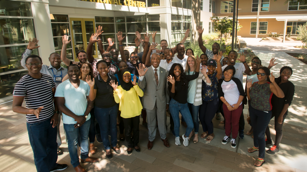 Chancellor Gary S. May and last summer’s Mandela Fellows, outside the International Center. (Gregopry Urquiaga/UC Davis) Chancellor Gary S. May and last summer’s Mandela Fellows, outside the International Center.