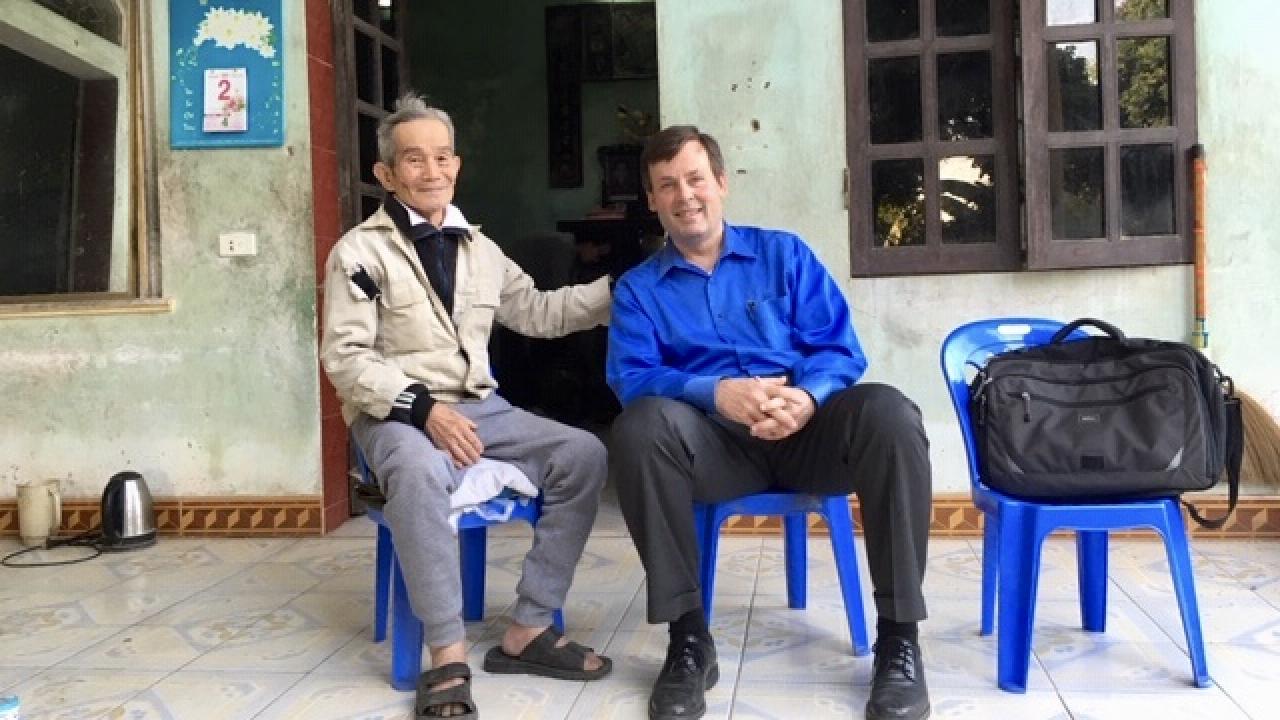 Hinton enroute to conduct an intervention In the field in Sóc Sõn, a semi-rural district in Hanoi. Many of the homes are accessible only by motorcycle or on foot.