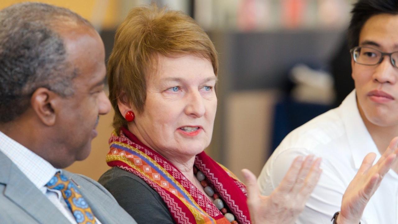 Joanna Regulska, the UC Davis vice provost and associate chancellor of global affairs, with Chancellor Gary May, is proud of the university's new "Global Education for All" initiative. Joanna Regulska with Chancellor and student