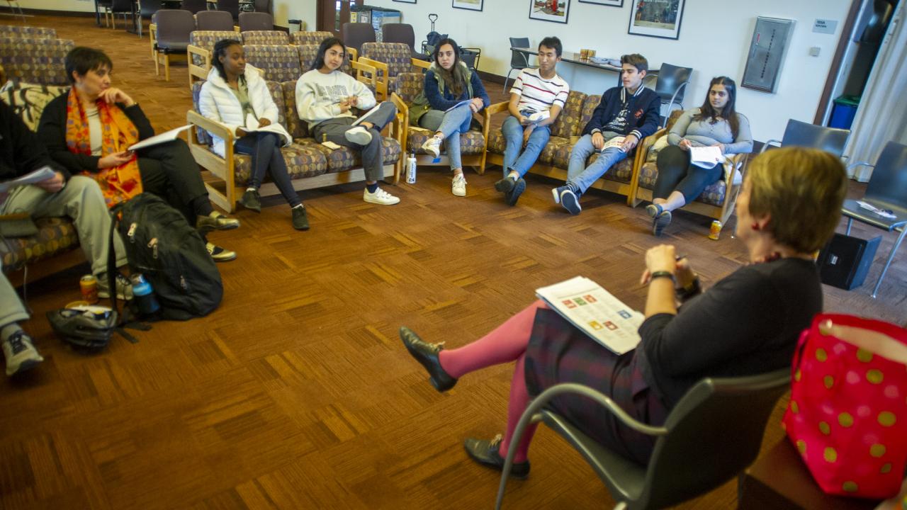Global Affairs Vice Provost and Dean Joanna Regulska (right) leading a discussion on the UN Sustainable Development Goal for Gender Equality during a Global Engagement Opportunity Living and Learning Community seminar for a mix of domestic and international students.