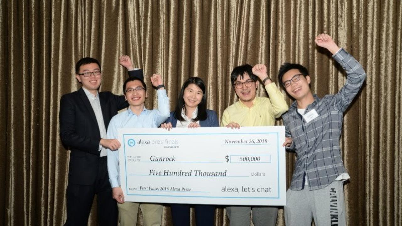 UC Davis graduate and undergraduate students celebrate their first place win in Amazon’s Alexa Prize competition.