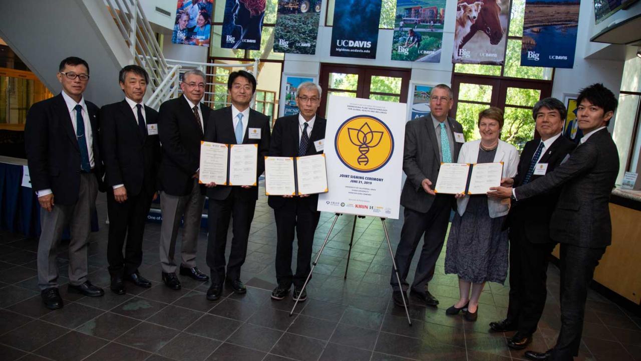 Leaders from Kirin, Osaka University and UC Davis gathered on campus Friday, June 21 to formally sign the exchange agreement.