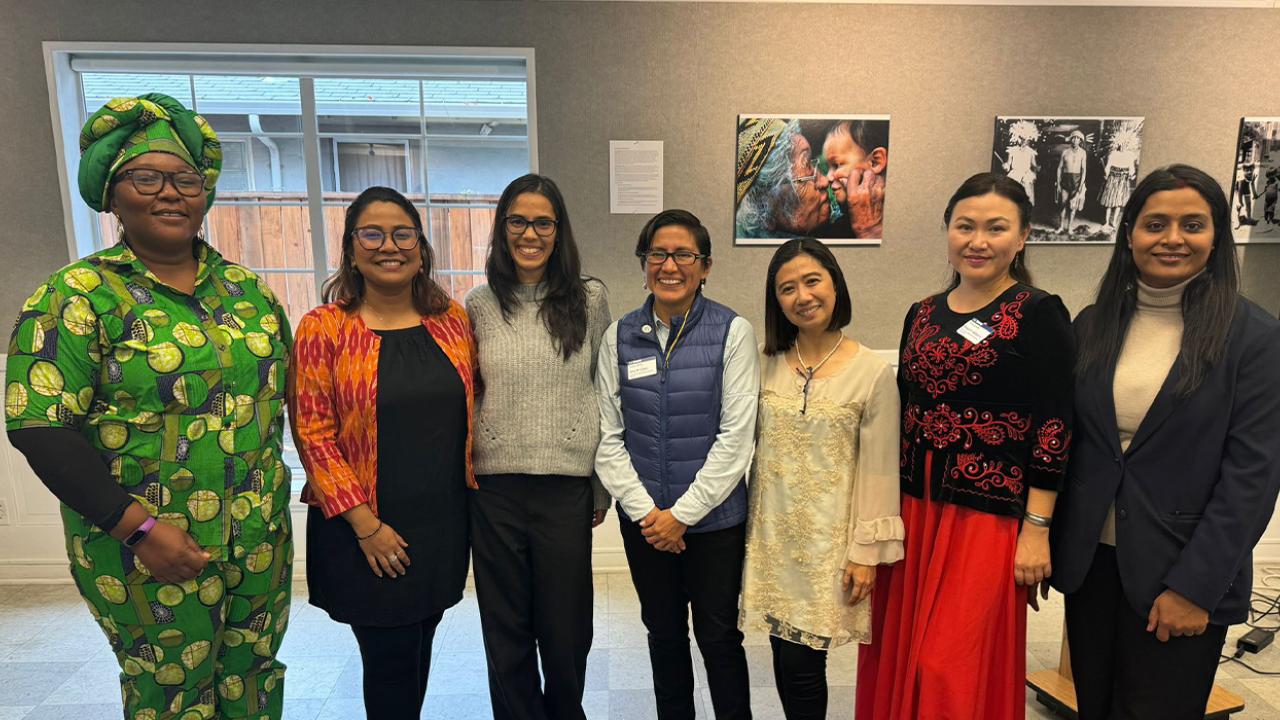 Seven women in the 2024-25 cohort of the UC Davis Humphrey Fellowship stand together for a group photo.