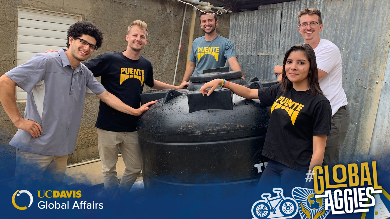 Tiven Buggy M.S. ’20 (second from left) and teammates from the nonprofit, Puente, take a break during construction of a rainwater harvesting water tank.