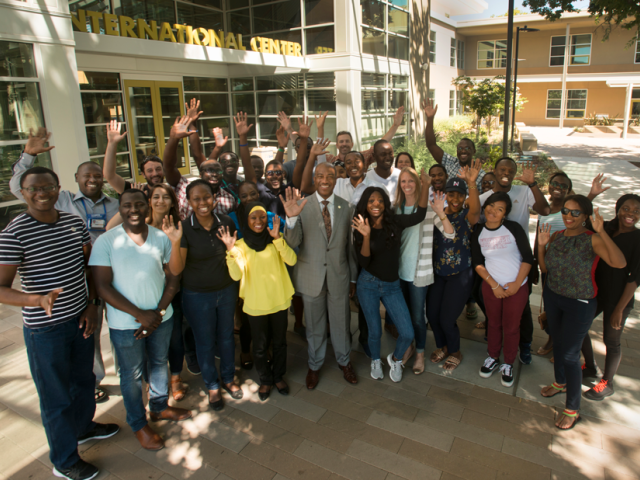 Chancellor Gary S. May and last summer’s Mandela Fellows, outside the International Center. (Gregopry Urquiaga/UC Davis) Chancellor Gary S. May and last summer’s Mandela Fellows, outside the International Center.