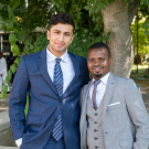 Zain Patel smiles with a Mandela Washington Fellow, Sévérin Ekpe, at the Mandela Washington Fellows Welcome Event outside the International Center. 