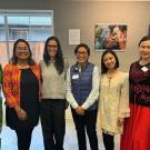 Seven women in the 2024-25 cohort of the UC Davis Humphrey Fellowship stand together for a group photo.
