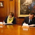 (L) Vice Provost and Associate Chancellor of Global Affairs Joanna Regulska of the University of California, Davis, and (R) Rector Ignacio Sánchez of Pontificia Universidad Católica de Chile signing the Agreement of Cooperation.