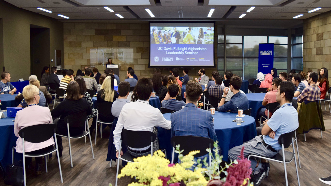 Audience listens at leadership seminar