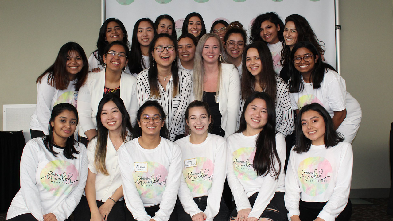 group of young women wearing shirts that say mental health iniative