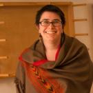 woman in a scarf smiling