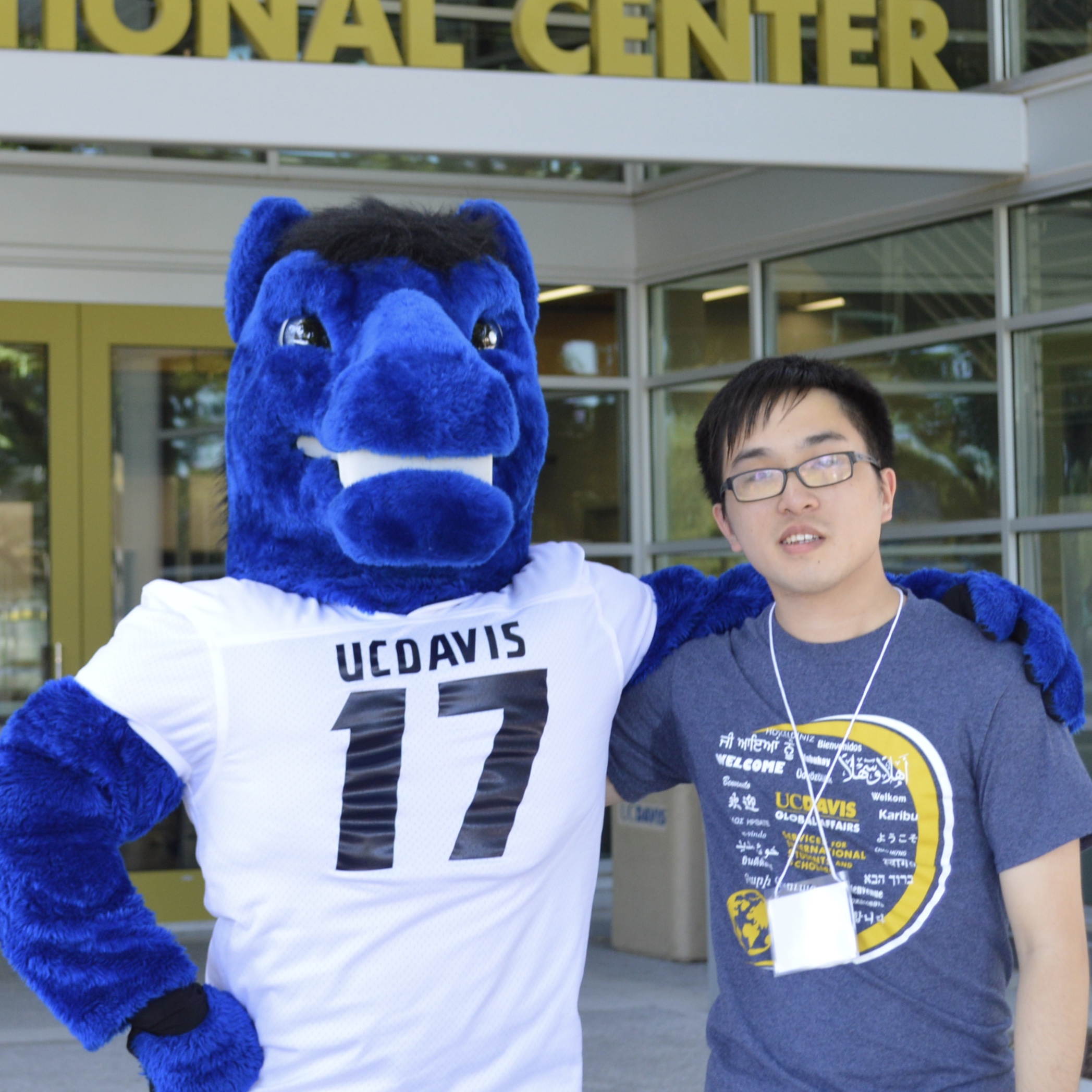student with mascot