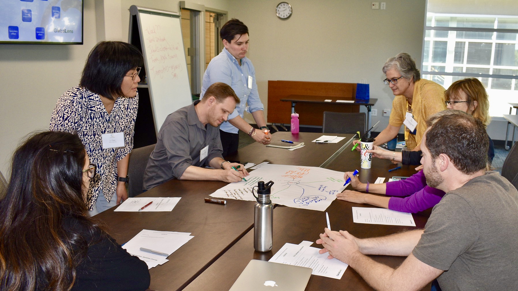 Faculty around table