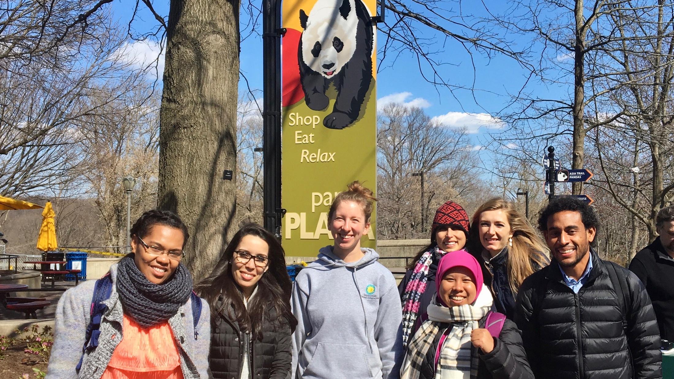 UC Davis Humphrey Fellows Litia Gaunavou-Tuberi (Fiji), Laila Annouri (Morrocco), Maria Fernanda Gonzalez (Ecuador), Anita Kazamer (Hungary), Fathimah Handayani (Indonesia), and Kahlil Hassanali (Trinidad and Tobago) alongside UC Davis alumna and Smithsonian National Zoological Park Animal Keeper Shellie Pick (center) at the Smithsonian National Zoological Park.
