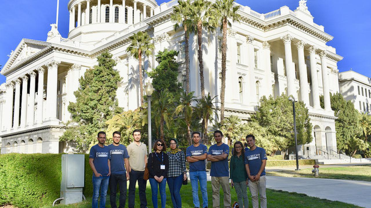 Fulbright Students from Afghanistan tour the California State Capitol. Rowan O'Connell Gates/UC Davis. students standing in front of the state capitol