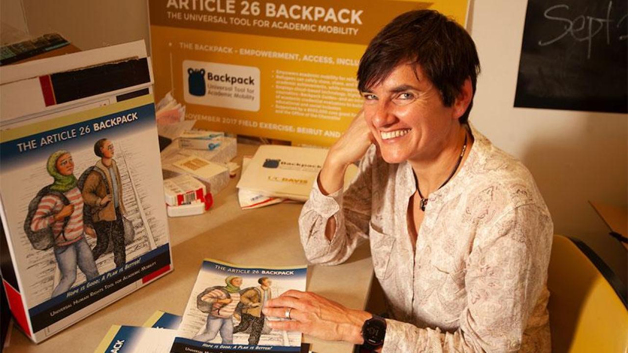 UC Davis doctoral student Maureen Burdock designed the comic book that will help explain Article 26 Backpack to Syrian refugees in Lebanon. (Gregory Urquiaga/UC Davis) Maureen Burdock with comic