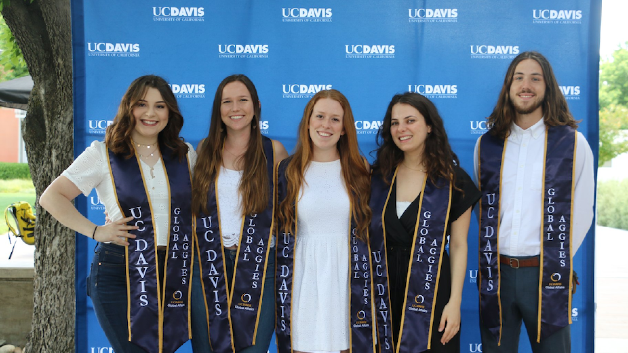 Rowan O’Connell-Gates (on the far right) with fellow Global Affairs student employees celebrating graduation. (Liz McAllister/UC Davis) Rowan O’Connell-Gates with fellow Global Affairs student employees celebrating graduation