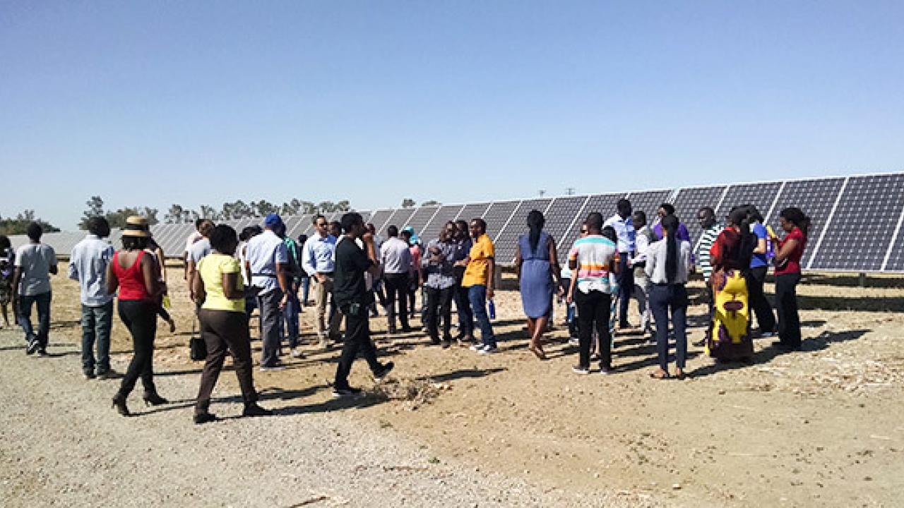 African energy experts in California as part of the State Department's Mandela Washington Fellowship tour a solar facility in Davis. Photo by Debra Kahn. energy-experts