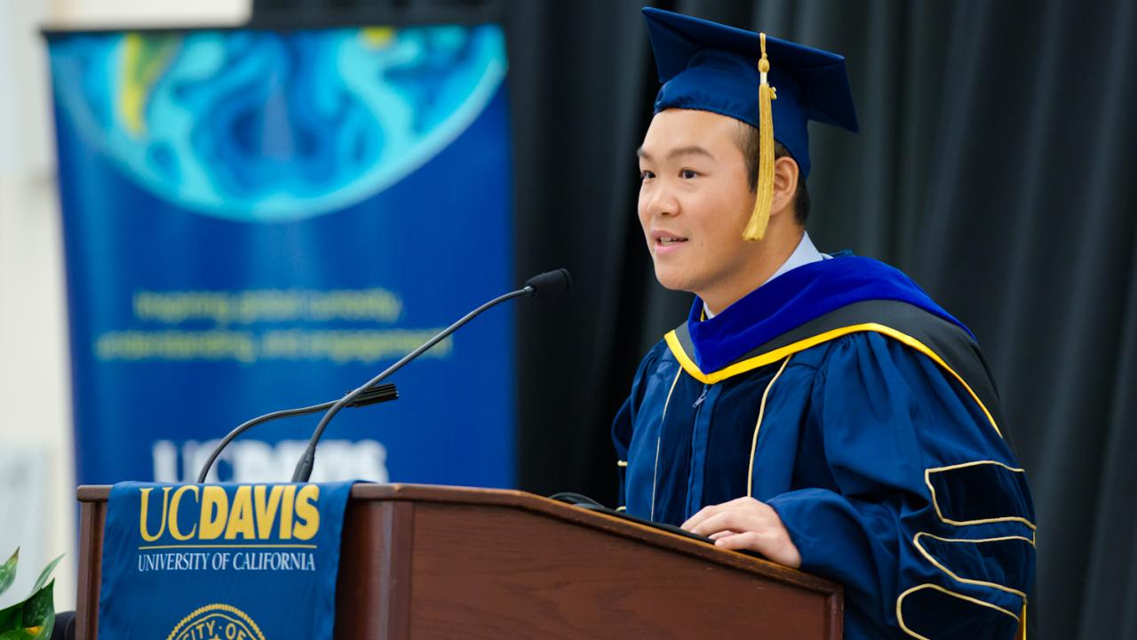 Zidong Li Ph.D. '18 speaking at International Graduation Celebration on June 14, 2018. TJ Ushing/UC Davis. Li speaking at graduation