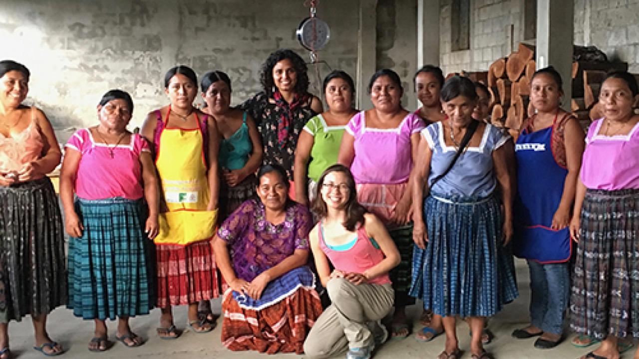 Graduate student Madeline Weeks and Karla Rueda McNeil of Cru Chocolate pose with members of the Red de Mujeres, a women's network in Guatemala, during chocolate making workshops with Fundación ProPetén. (Madeline Weeks) Graduate student Madeline Weeks and Karla Rueda McNeil of Cru Chocolate pose with members of the Red de Mujeres, a women's network in Guatemala